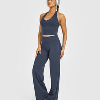 SoftMotion™ Halter Neck Mid Vest with Built in Bra Shelf with White Logo | True Blue