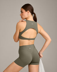 SoftMotion™ High Neck Sports Bra with Grey Logo | Alpine Green