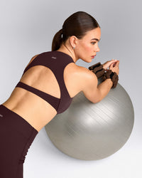 SoftMotion™ High Neck Sports Bra with Grey Logo | Plum Brown