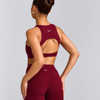 SoftMotion™ High Neck Sports Bra with Grey Logo | Ruby Red