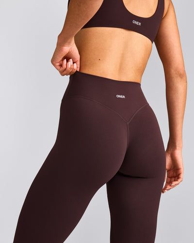 SoftMotion™ High Waisted Leggings with Grey Logo | Plum Brown