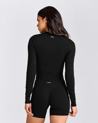 SoftMotion™ Long Sleeve Mid Top with Grey Logo | Black