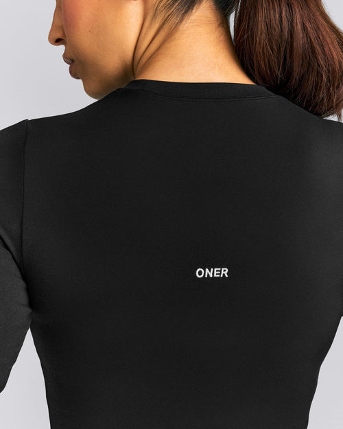 SoftMotion™ Long Sleeve Mid Top | Black