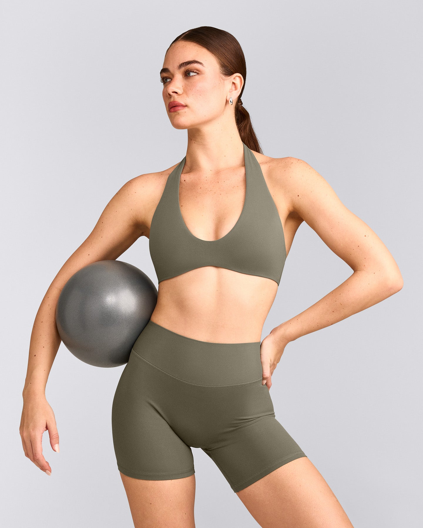 SoftMotion™ Minimal Halter Neck Bralette with Grey Logo | Alpine Green
