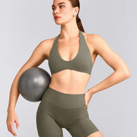 SoftMotion™ Minimal Halter Neck Bralette with Grey Logo | Alpine Green