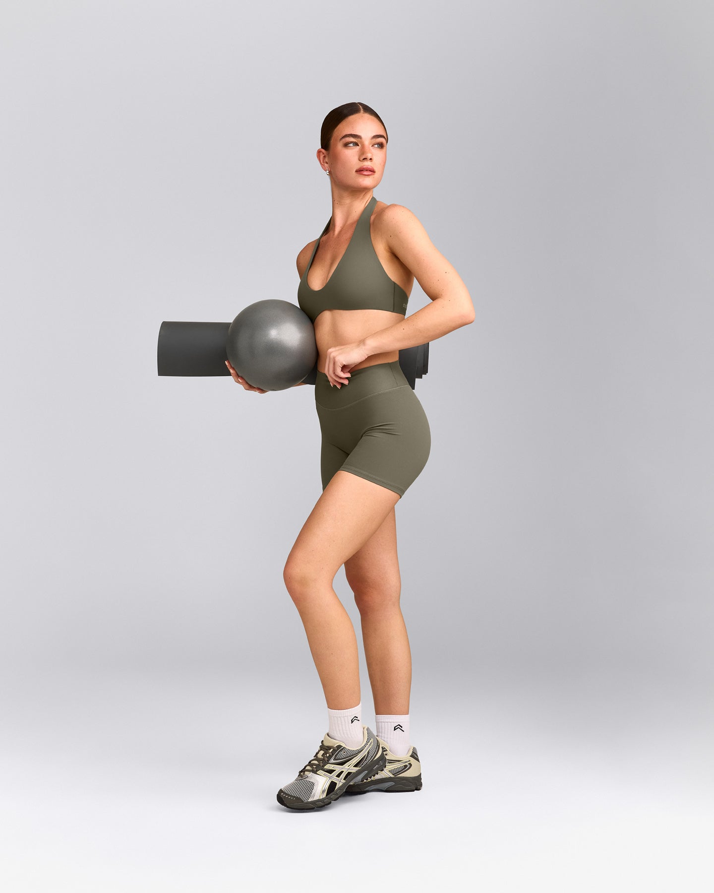 SoftMotion™ Minimal Halter Neck Bralette with Grey Logo | Alpine Green