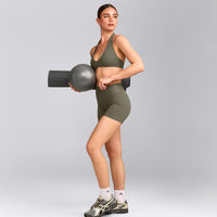 SoftMotion™ Minimal Halter Neck Bralette with Grey Logo | Alpine Green