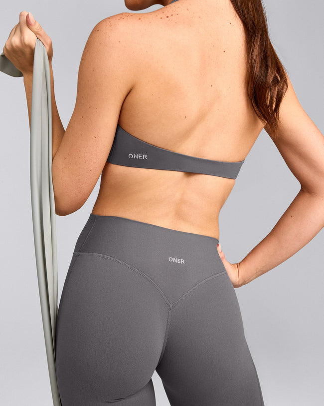SoftMotion™ Minimal Halter Neck Bralette with Grey Logo | Ash Grey