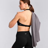 SoftMotion™ Minimal Halter Neck Bralette with Grey Logo | Black