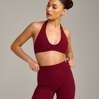 SoftMotion™ Minimal Halter Neck Bralette with Grey Logo | Ruby Red