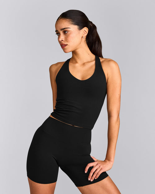 SoftMotion™ Racer Back Mid Vest with Built in Bra Shelf with Grey Logo | Black