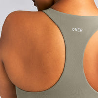 SoftMotion™ Racer Back Mid Vest with Built in Bra Shelf | Alpine Green