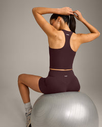 SoftMotion™ Racer Back Mid Vest with Built in Bra Shelf with Grey Logo | Plum Brown