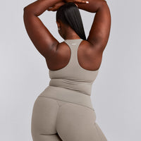 SoftMotion™ Racer Back Vest with Built in Bra Shelf with White Logo | Warm Sand