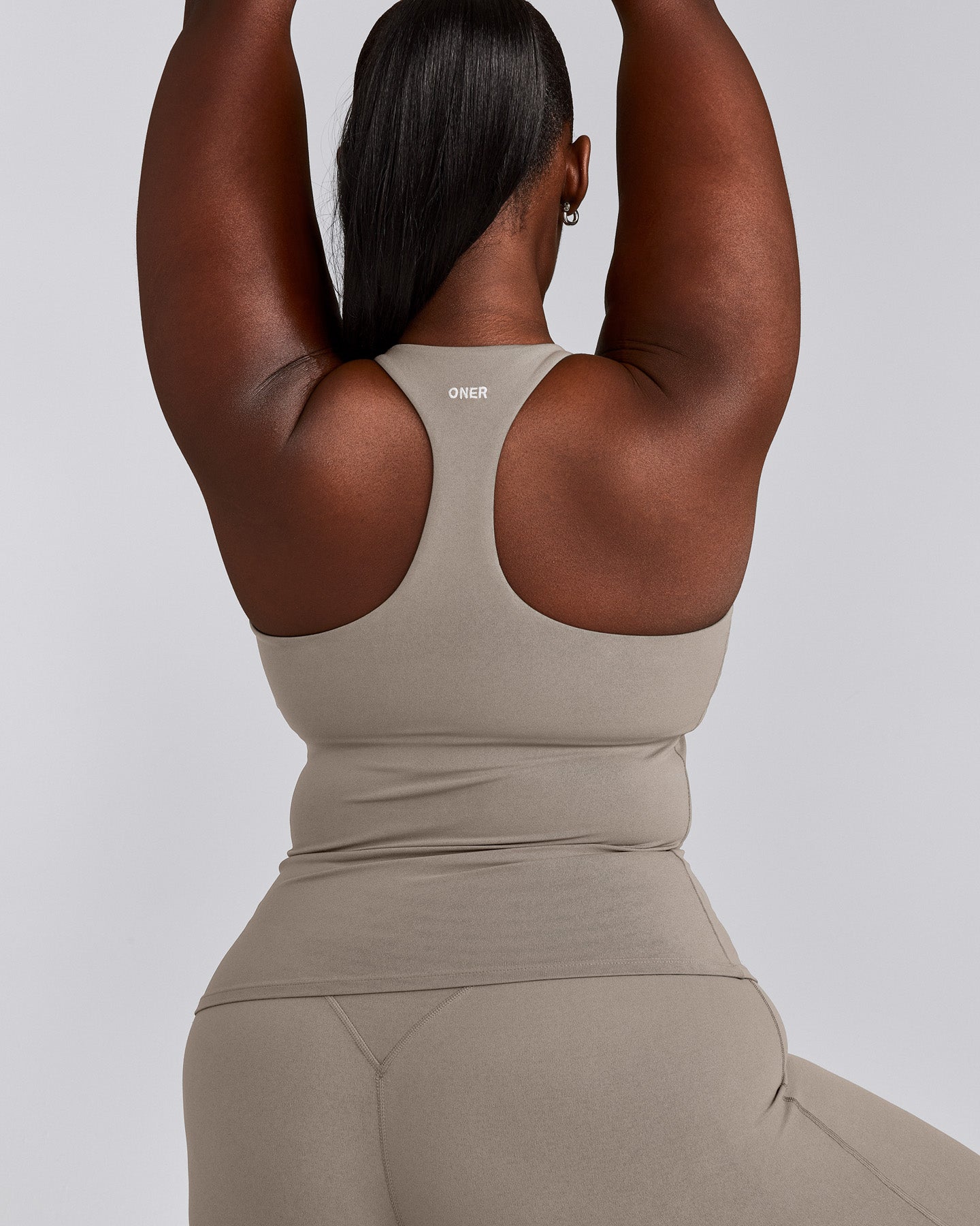 SoftMotion™ Racer Back Vest with Built in Bra Shelf with White Logo | Warm Sand