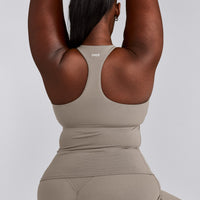 SoftMotion™ Racer Back Vest with Built in Bra Shelf with White Logo | Warm Sand