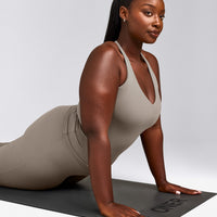 SoftMotion™ Racer Back Vest with Built in Bra Shelf with White Logo | Warm Sand