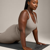 SoftMotion™ Racer Back Vest with Built in Bra Shelf with White Logo | Warm Sand