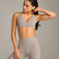 SoftMotion™ Scoop Back Bralette with White Logo | Warm Sand