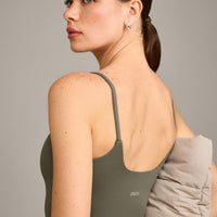 SoftMotion™ Strappy Mid Vest with Built in Bra Shelf with Grey Logo | Alpine Green