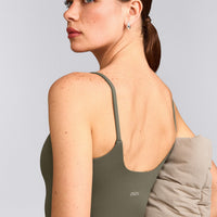 SoftMotion™ Strappy Mid Vest with Built in Bra Shelf with Grey Logo | Alpine Green