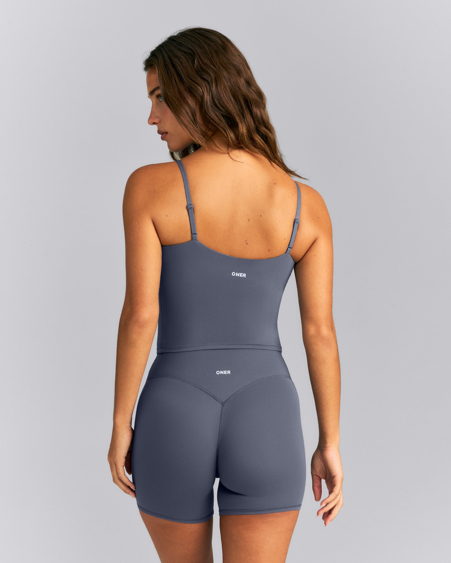 SoftMotion™ Adjustable V Neck Mid Vest with Built in Bra Shelf | Granite Blue