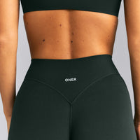 SoftMotion™ Wrap Flared Leggings | Emerald Noir