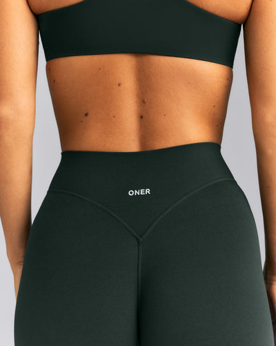 SoftMotion™ Wrap Flared Leggings | Emerald Noir