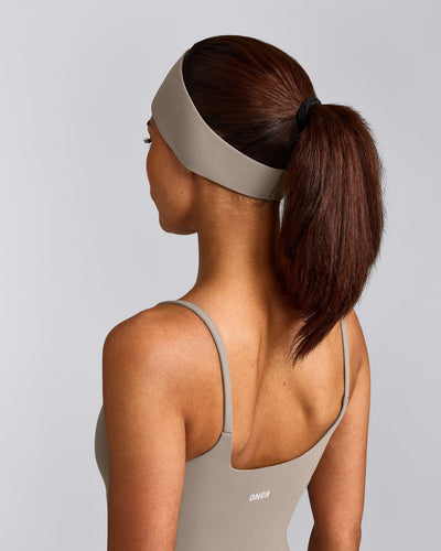 SoftMotion™ Headband with White Logo | Warm Sand