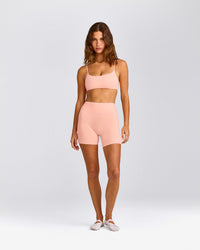 SoftMotion™ High Waisted Shorts 6" with Grey Logo | Peach Orange