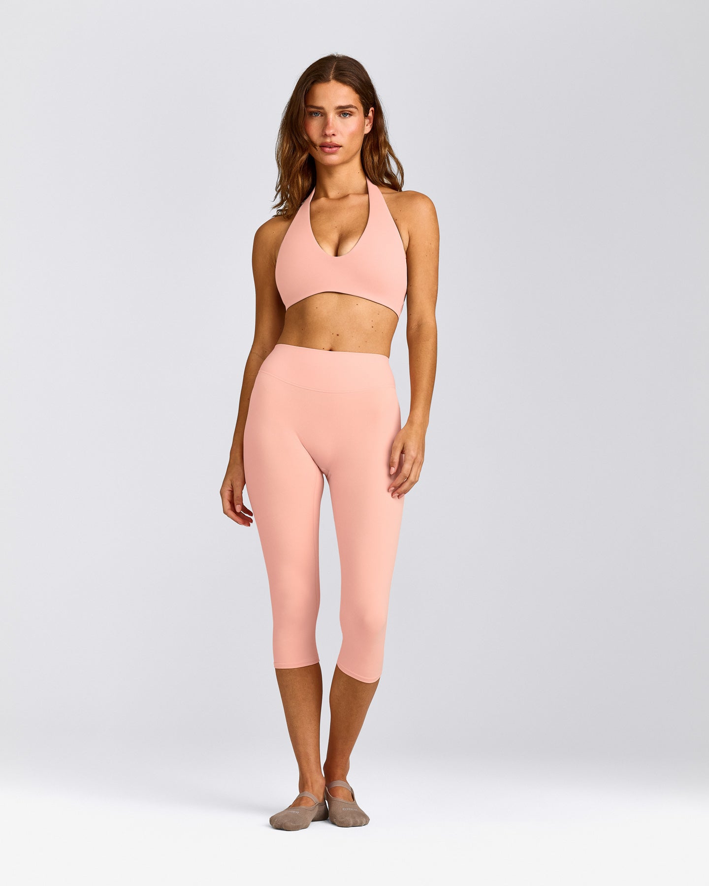 SoftMotion™ Minimal Halter Neck Bralette with Grey Logo | Peach Orange