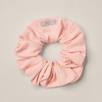 SoftMotion™ Scrunchie with Grey Logo | Peach Orange