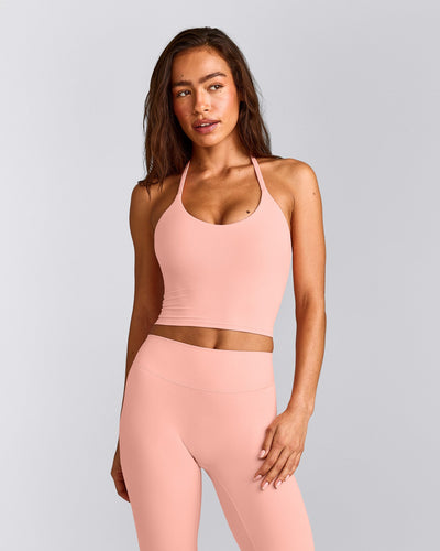 SoftMotion™ Strappy Halter Neck Mid Vest with Built in Bra Shelf with Grey Logo | Peach Orange
