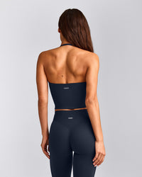 SoftMotion™ Strappy Halter Neck Mid Vest with Built in Bra Shelf with Grey Logo | True Blue