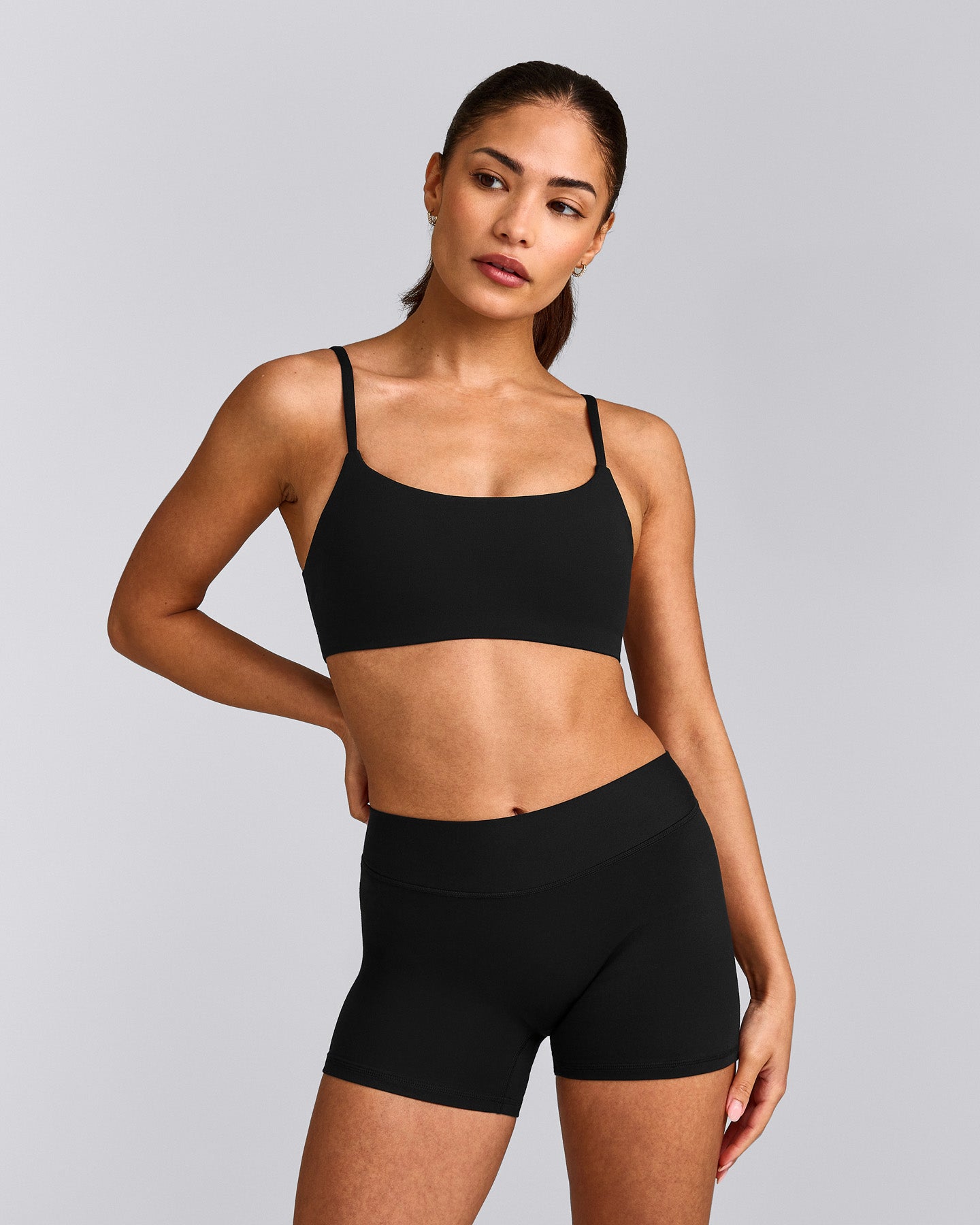 SoftMotion™ Strappy Sports Bra with Grey Logo | Black