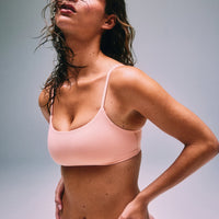SoftMotion™ Strappy Sports Bra with Grey Logo | Peach Orange