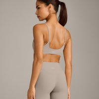 SoftMotion™ Strappy Sports Bra with White Logo | Warm Sand