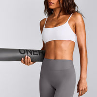 SoftMotion™ Strappy Sports Bra with Grey Logo | White