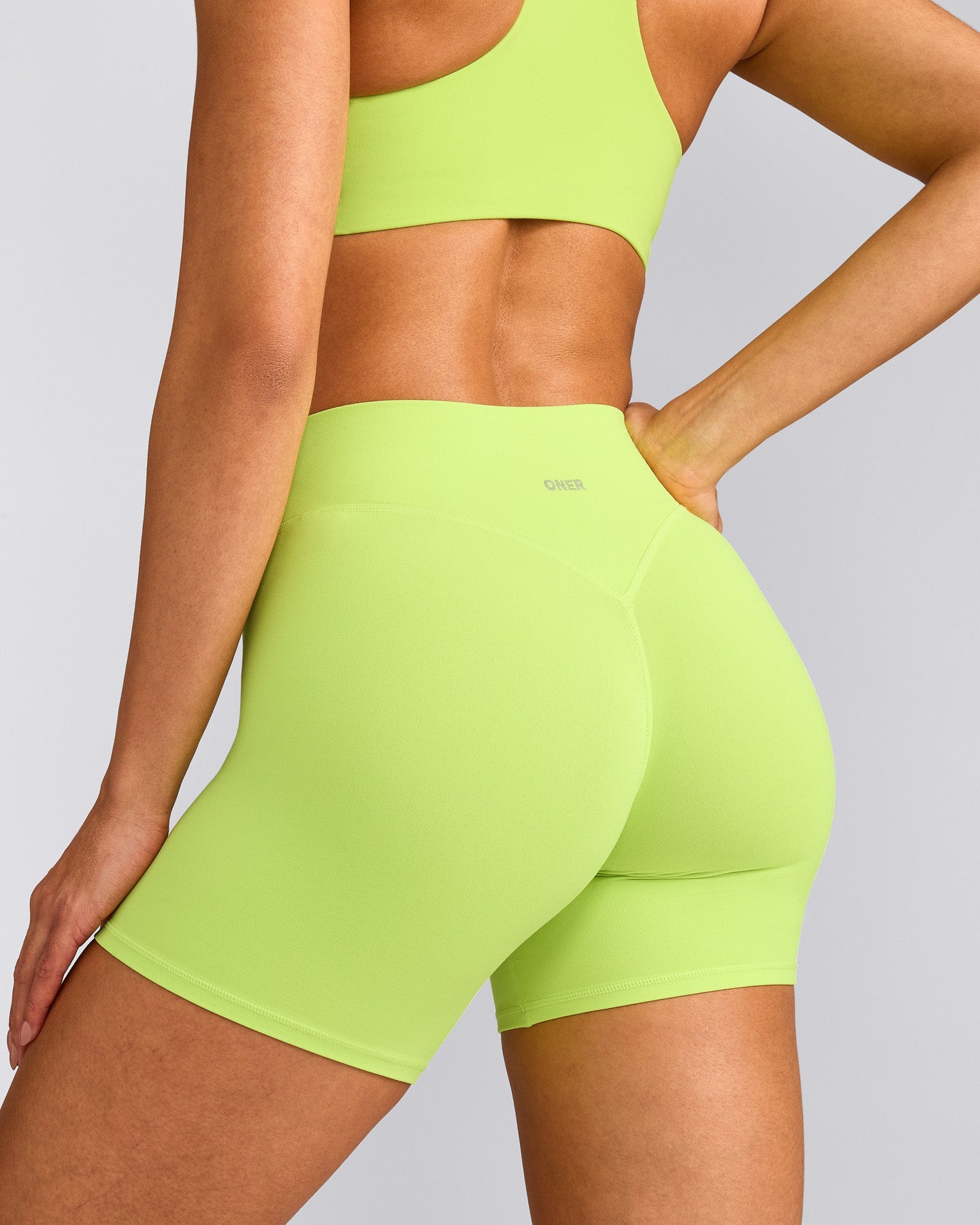 SoftMotion™ High Waisted Shorts 6" with Grey Logo | Citrus Green