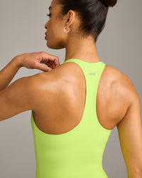 SoftMotion™ Racer Back Mid Vest with Built in Bra Shelf with Grey Logo | Citrus Green