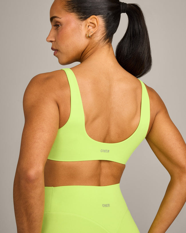 SoftMotion™ Scoop Back Bralette with Grey Logo | Citrus Green