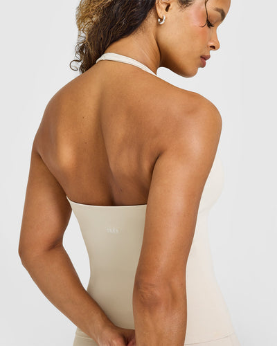 SoftMotion™ Halter Neck Vest with Built in Bra Shelf with White Logo | Sand