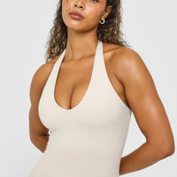 SoftMotion™ Halter Neck Vest with Built in Bra Shelf with White Logo | Sand