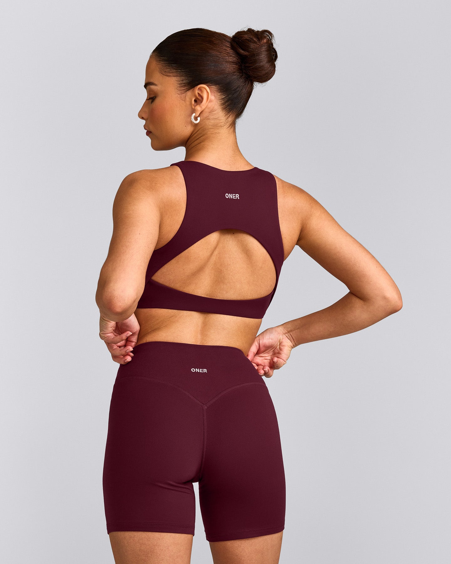 SoftMotion™ High Neck Sports Bra with Grey Logo | Cherry Lacquer Purple