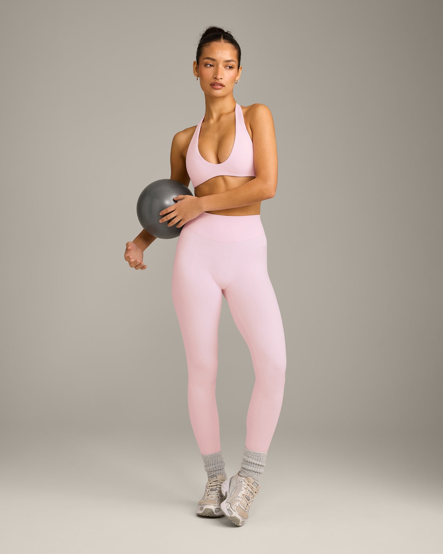 SoftMotion™ Minimal Halter Neck Bralette with Grey Logo | Soft Girl Pink