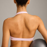 SoftMotion™ Minimal Halter Neck Bralette with Grey Logo | Soft Girl Pink