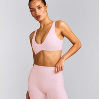 SoftMotion™ Scoop Back Bralette with Grey Logo | Soft Girl Pink