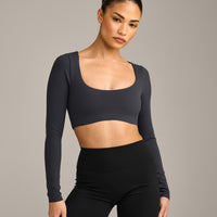 SoftMotion™ Scoop Neck Long Sleeve Crop Top with Built in Bra Shelf with Grey Logo | Coal