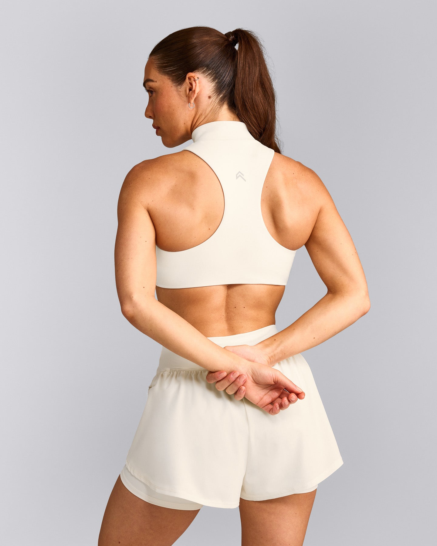 EasyLift™ Zip High Neck Sports Bra with Grey Logo | Marshmallow White