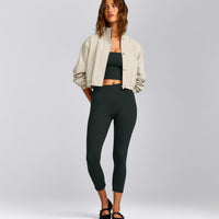 SoftMotion™ Bandeau Mid Vest with Built in Bra Shelf with Grey Logo | Emerald Noir